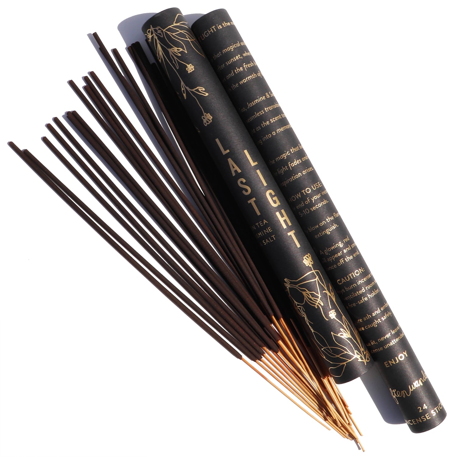 Incense sticks with black packaging on a white background