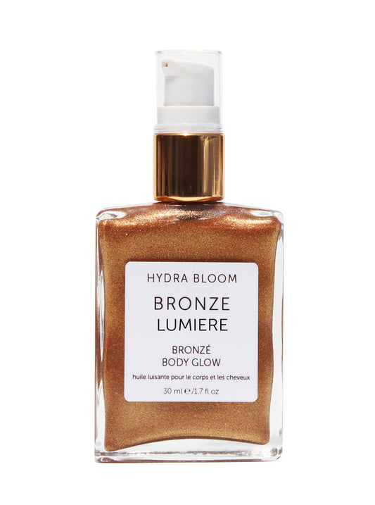 Bronze Lumiere body glow product with Hydra Bloom label on a white background