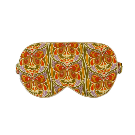 Decorative butterfly print eye mask with a colorful pattern on a white background