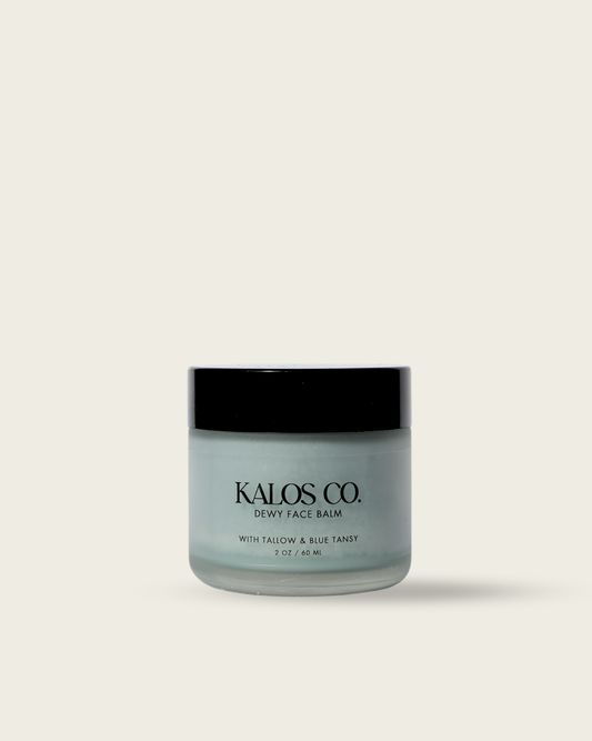 Jar of Kalos Co. balm on a white background