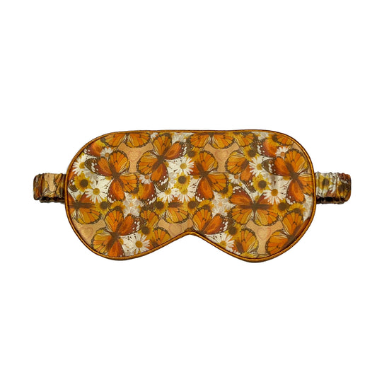 Butterfly patterned eye mask on a white background