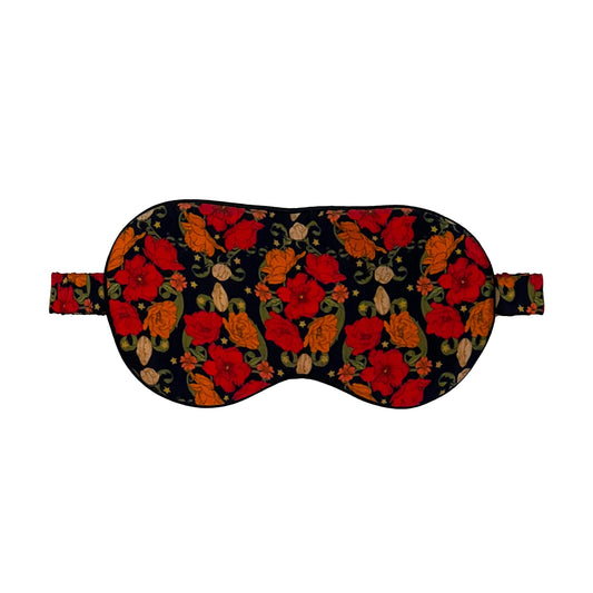 Poppy floral patterned sleep mask on a white background