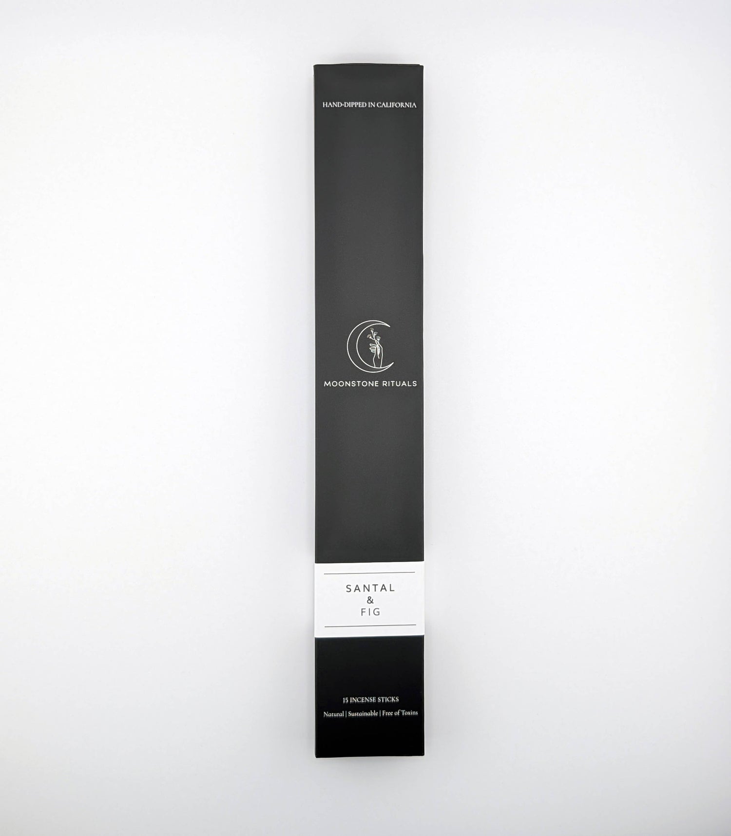 Black and white product packaging with 'Moonlitine Rituals' branding on a white background