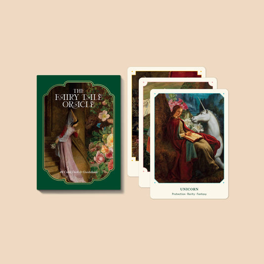 Fairy tale oracle card set with a green cover and tarot-style cards on a beige background