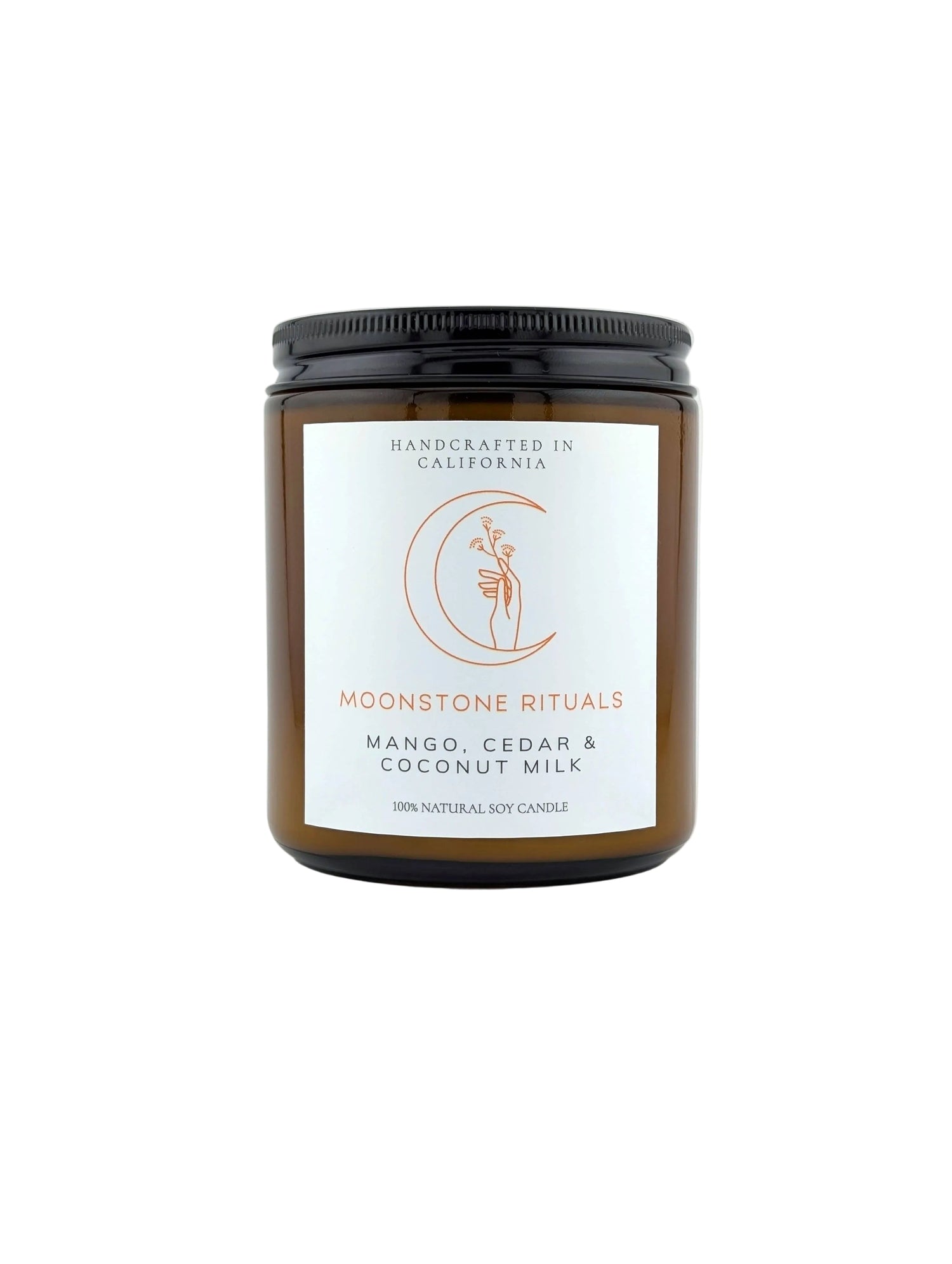 Moonstone Rituals candle with label on a white background