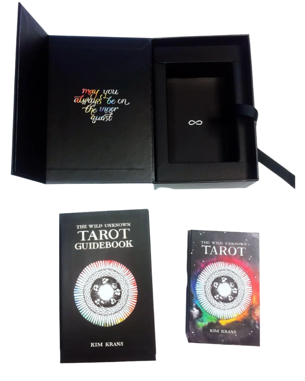 the wild unknown tarot deck and guide book opened up from box